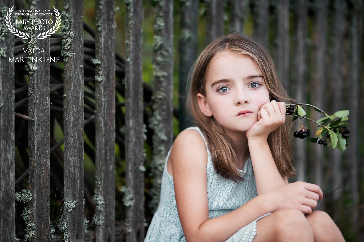 Mostly what catches my attention when photographing children is their eyes.<br />
This girl's eyes are so big and so expressive!<br />
I love this photo!