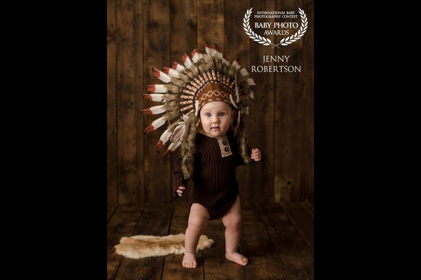I had no idea his mother was going to bring this Native American headdress to his 9-month session but I am so glad she did! His father has heritage from the Pottawatomie Nation. 