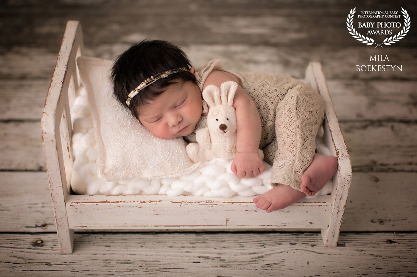 This gorgeous image of a beautiful 10-day old baby girl will be printed BIG and will be hanging in her nursery - that is HOW MUCH her parents loved this shot and the nursery is decorated in a bunny/rabbit theme - so this will be an amazing addition.  I am an on-location photographer and always bring with me a few little plush toys to photograph with my newborn clients. As soon as I have realized that her nursery is decorated with bunnies and Easter is around the corner - this set up was created!