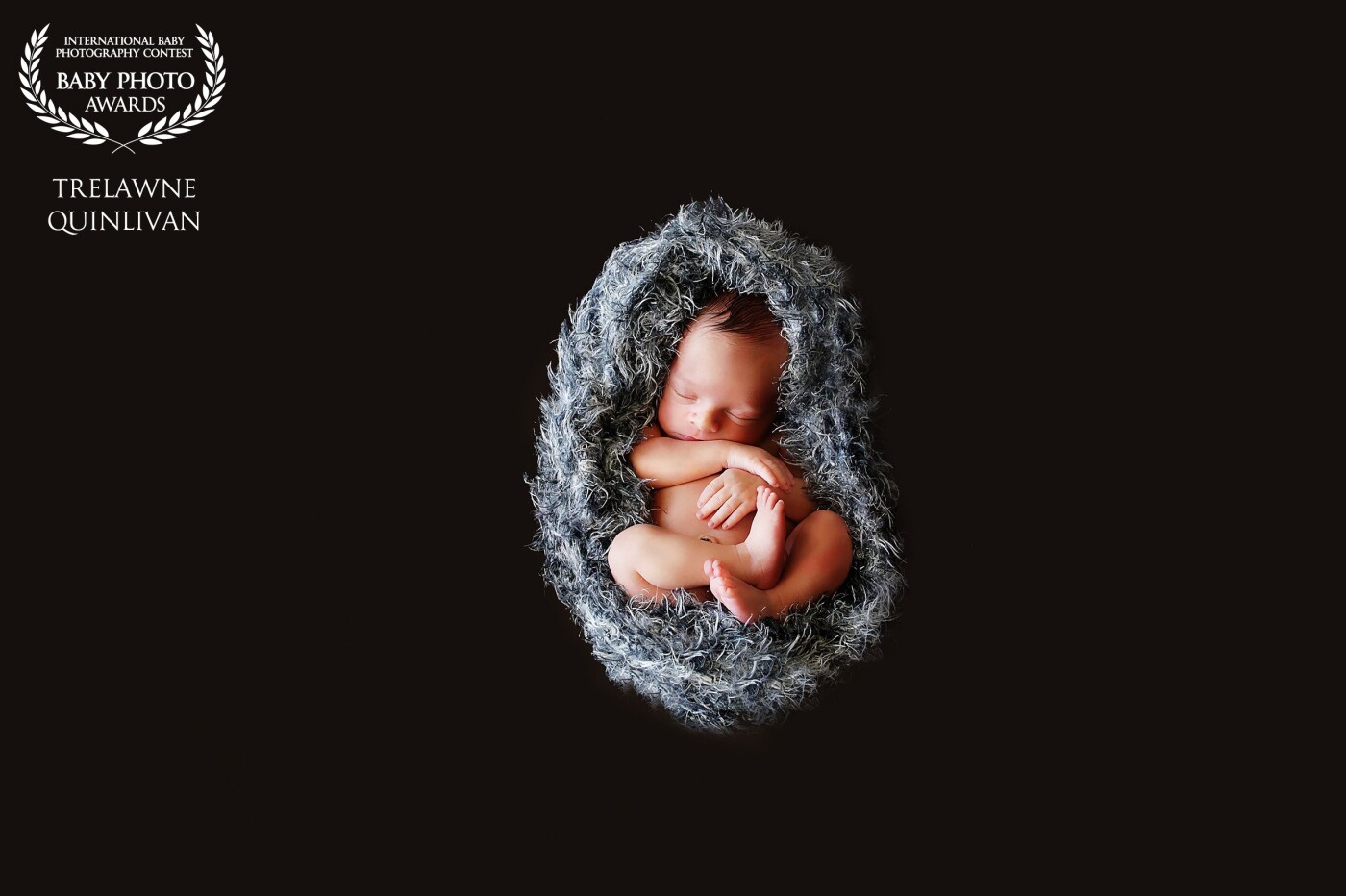 Little Cooper was the perfect subject, he happily slept through the whole shoot which made capturing this image really easy. I love the way the grey wrap follows the shape he makes and cocoons him in.