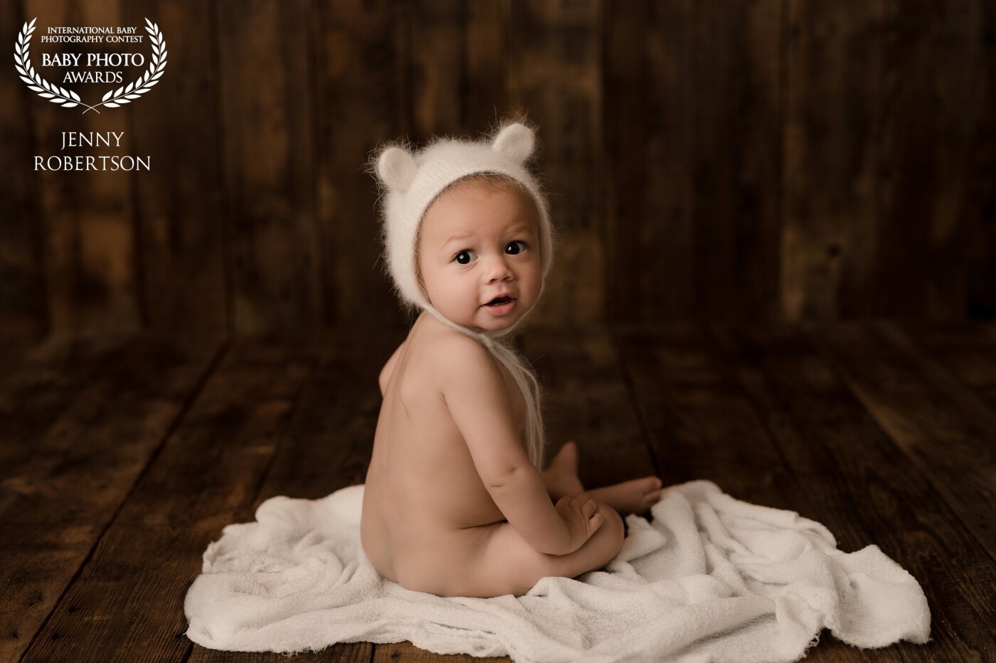 Oliver is such a beautiful little boy. I've had this image of him planned in my head since his newborn pictures when I posed him in a bucket with the same bear bonnet for newborns. He nailed this pose perfectly.