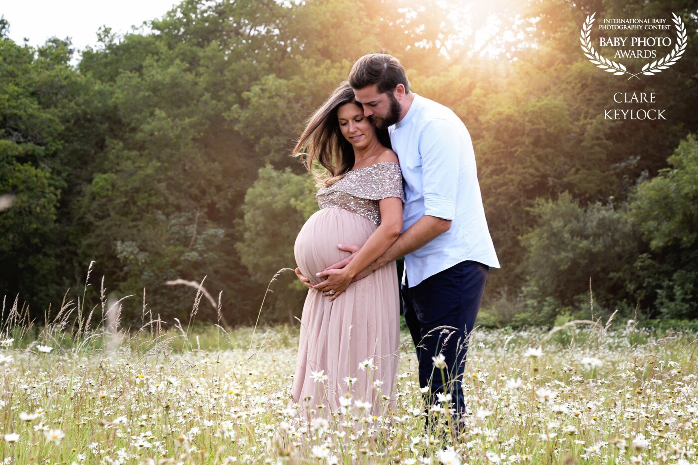 I absolutely loved photographing this beautiful couple. So honored to record this magical time for them. We had such a lovely afternoon in the gorgeous wildflower field.  Everything was perfect, the lighting, the field, her beautiful bump. Since this photo they have welcomed two beautiful little girls, I can't wait to photograph them all next week.