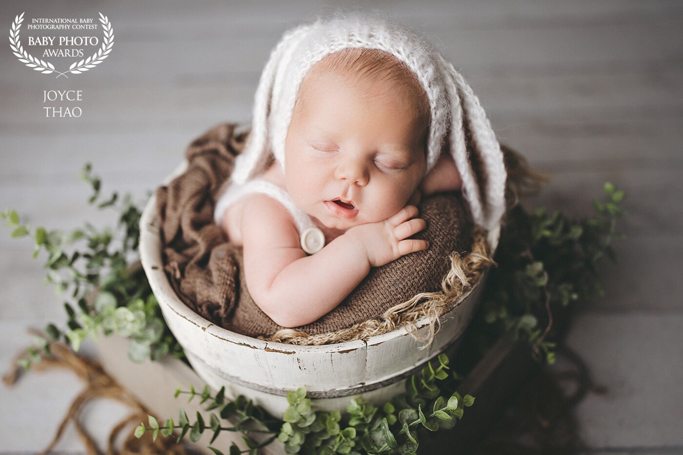 Mom had asked for an Easter/Earth Day themed session because the baby was going to be arriving close to that timeframe... and then RONA happened... and we weren't able to photograph this little fella until a month later! I must say... he did such a great job snoozing away even at almost 1-month-old! Cutest little bunny ever.