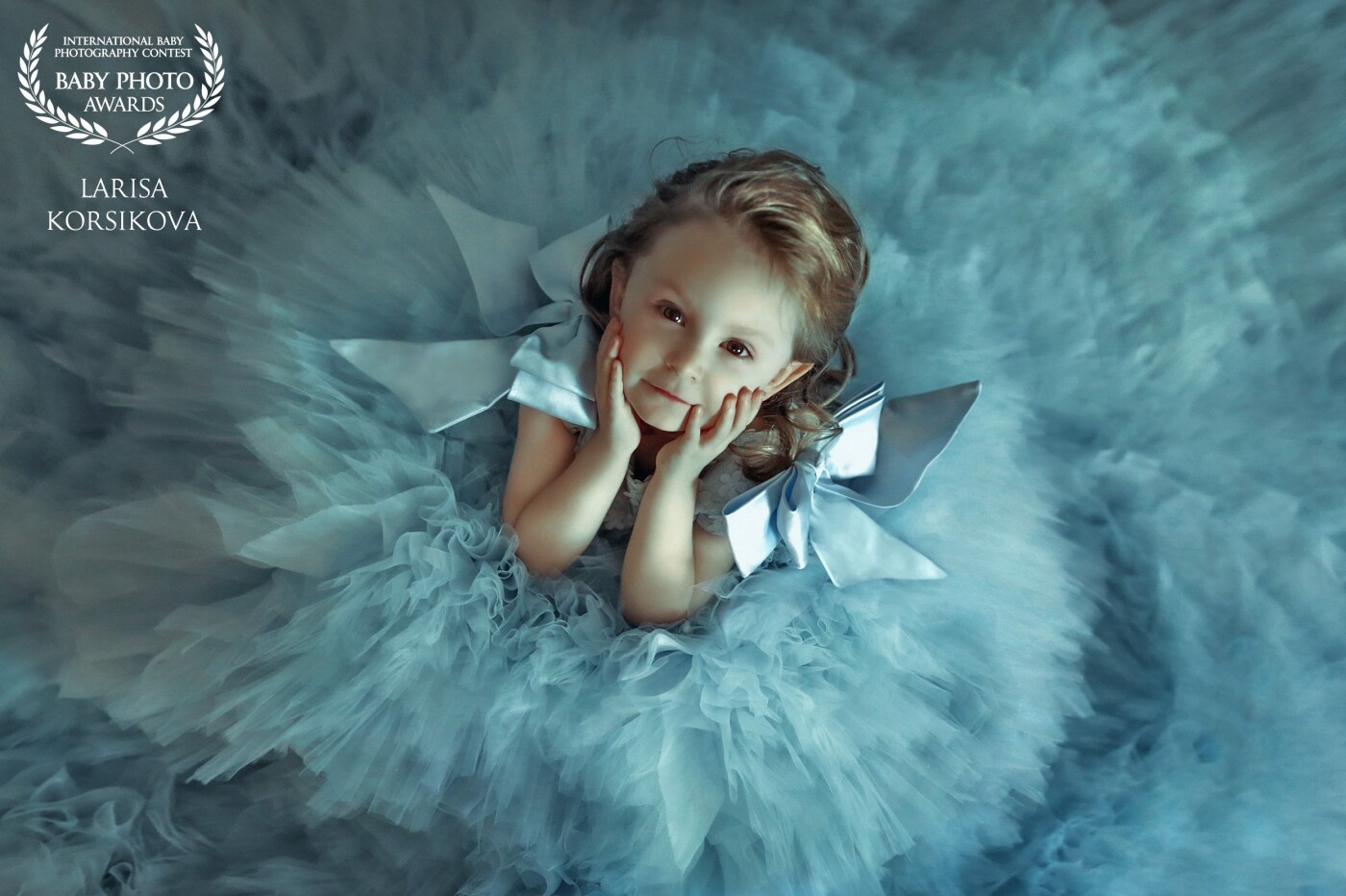 My little daughter Aurora loves to play a princess and I asked her to pose for me so I could take a picture of her with this beautiful blue dress.