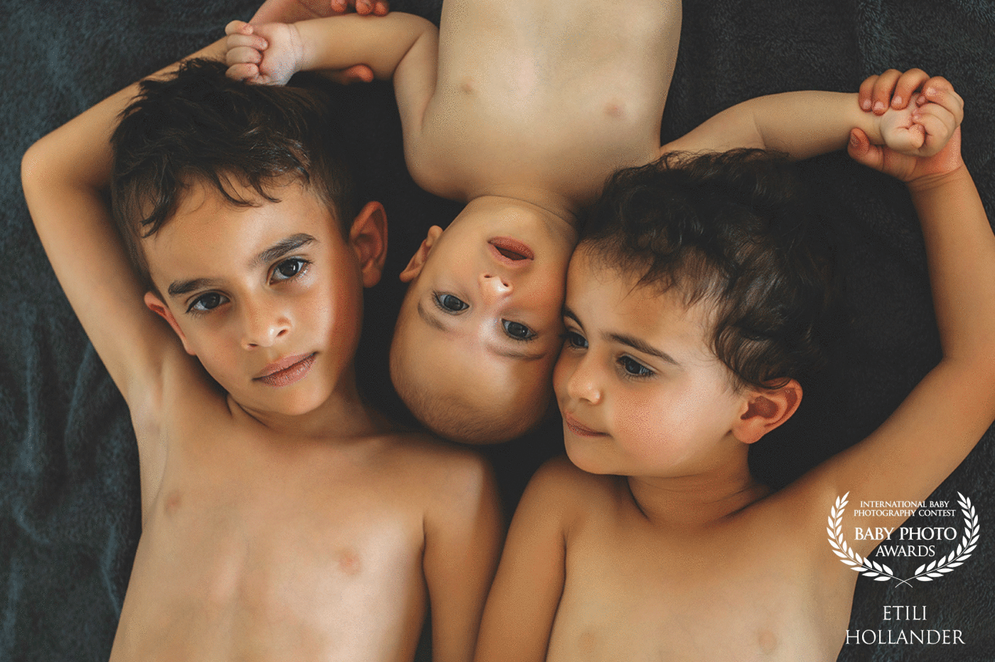As a photographer, I found that taking pictures of my own kids is the hardest, they never agree to cooperate with me:) Those are my beautiful kids, Omri, Gefen, and Ethan.