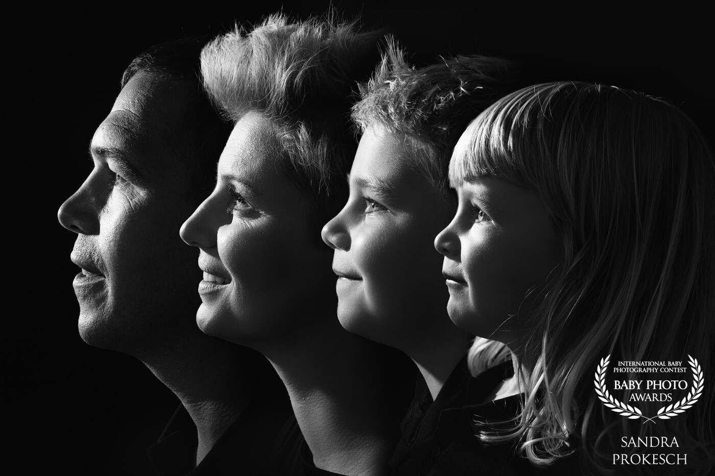 This beautiful family wanted something special, a portrait that will be watched every day, a portrait that will decorate their house. I photographed all four people separately and then created one picture in photoshop. My intention was to capture the same light and shadows in all four shapes. I'm glad I made the next family happy. These are memories for many generations.