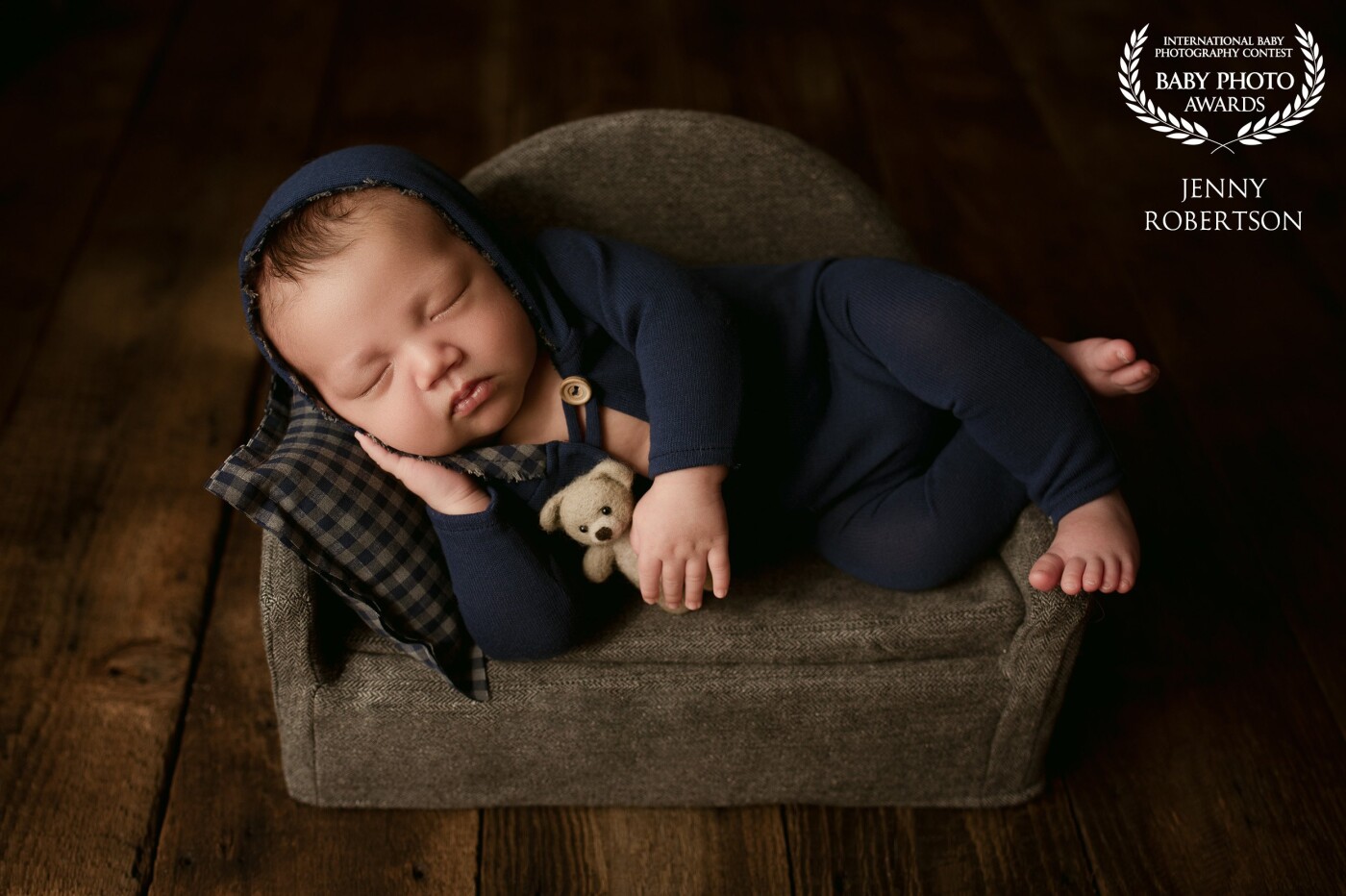 Little Liam - I was so excited to get this image with 1-month-old Liam. He looks so sweet and relaxed cuddled up on the couch with his teddy bear. 