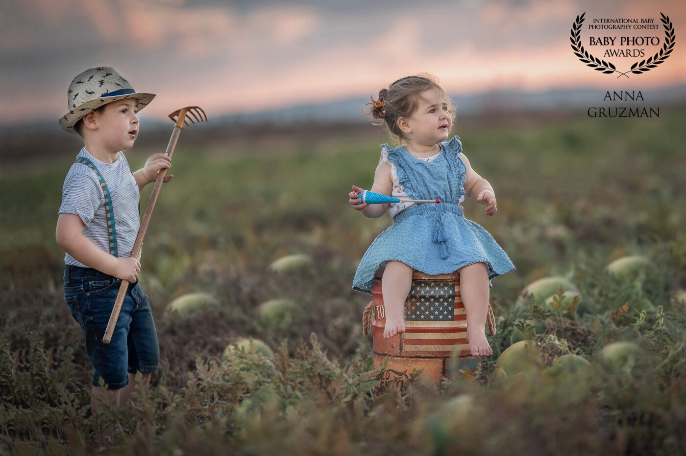 A picture of my own children - Adam and Emma in a watermelon field.  My favorite part of children's photography is their curiosity about nature.  The smile on their faces to discover new things is worth every moment.