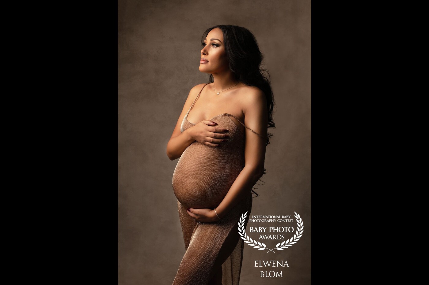 This gorgeous Mom-to-be was just absolutely glowing in this gold metallic dress. I love the delicateness of the dress, the strap falling off the shoulder, and just a tender, serene moment captured.