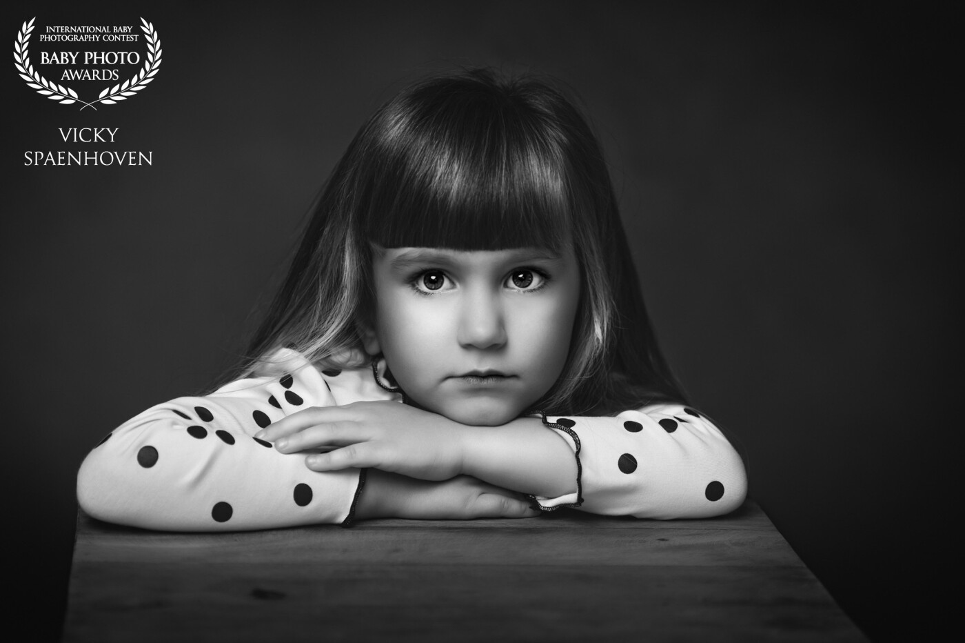 This is my lovely daughter, Naomi. I tried different lighting techniques that I learned recently from the talented Paulina Duczman. I think this one turned out very well in black and white. I love those moody pictures! 