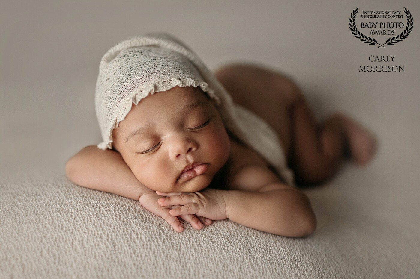 This sweet little girl was an angel during her Newborn Session. Her mother, father and big brother had been awaiting her arrival and when I came for her session I could see how much she was adored. Aren't the ruffles on this sleepy cap just adorable?