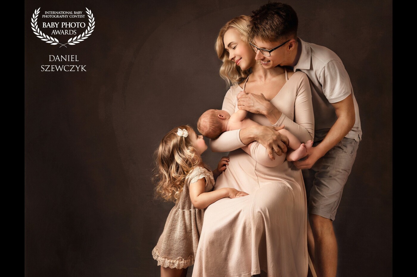 This is the first photo of all 4 of us, that was taken after the birth of our son . Photo was shooted on tripod and this is the single photo ( from dozens not successful ) that have stolen our hearts and hang big printed on our wall now :-)
