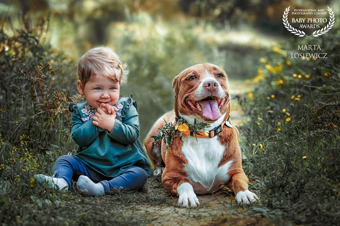 Photo is called "First spring together". It was taken at the begining of spanish spring. Lola is "teoreticly" a dangerous dog. So puting next to her 10 month Zoe was about to show that even if dog looks dangerous, she is friendly and calm, and love spending time with Zoe, enjoing their first spring together. Appearances can be deceiving. And you shouldn't judge by appearance.