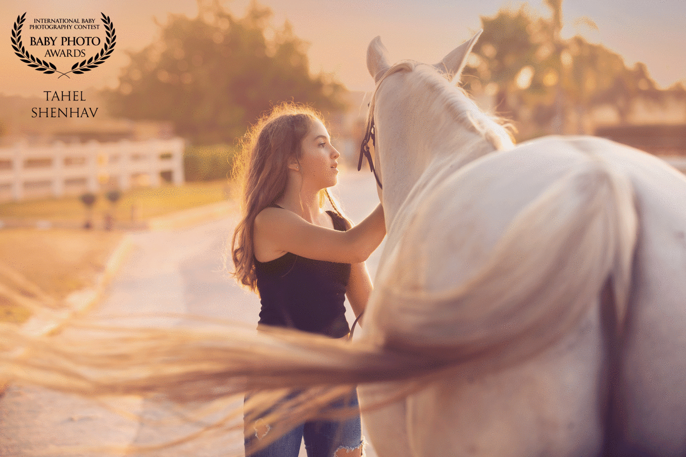Horse. I heard about Emanuel's love for horses from our first conversation, even before we chose locations for her photos, one thing was clear: the photoshoots would include her horse. I think her love for the horse can not be missed in this picture either. What do you think?