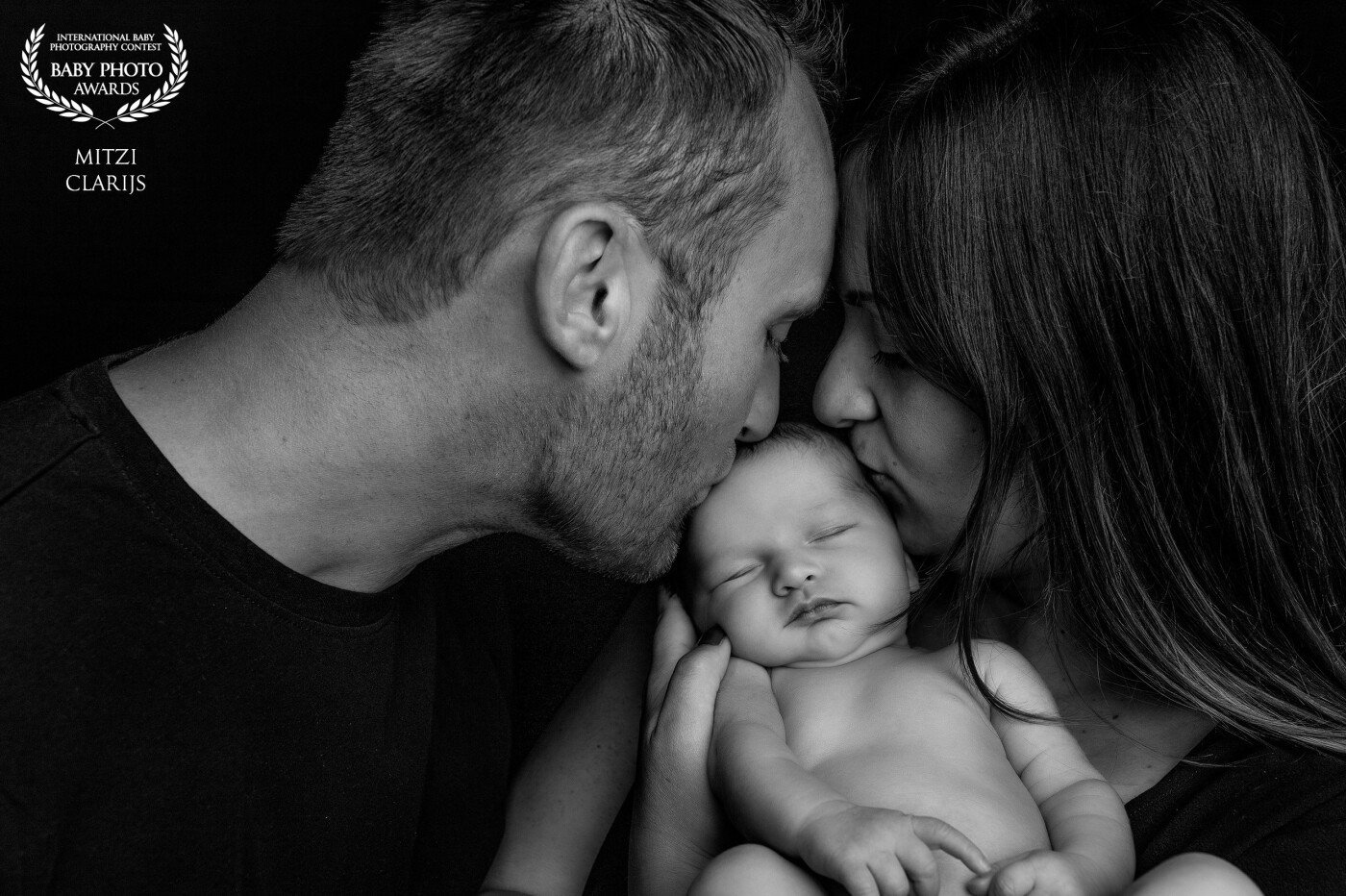 I love to capture these moments; the love between the parents and their newborn baby. <br />
I always tell them to cuddle, sniff that typical newborn smell, give kisses.. And I will capture the true emotions.