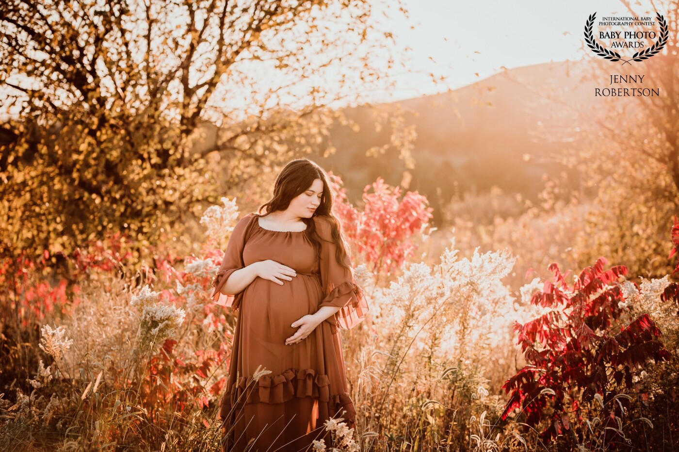 A gorgeous Fall maternity session with beautiful light and colors. This was taken on the edge of a parking lot but I knew it was the perfect location when I saw it.