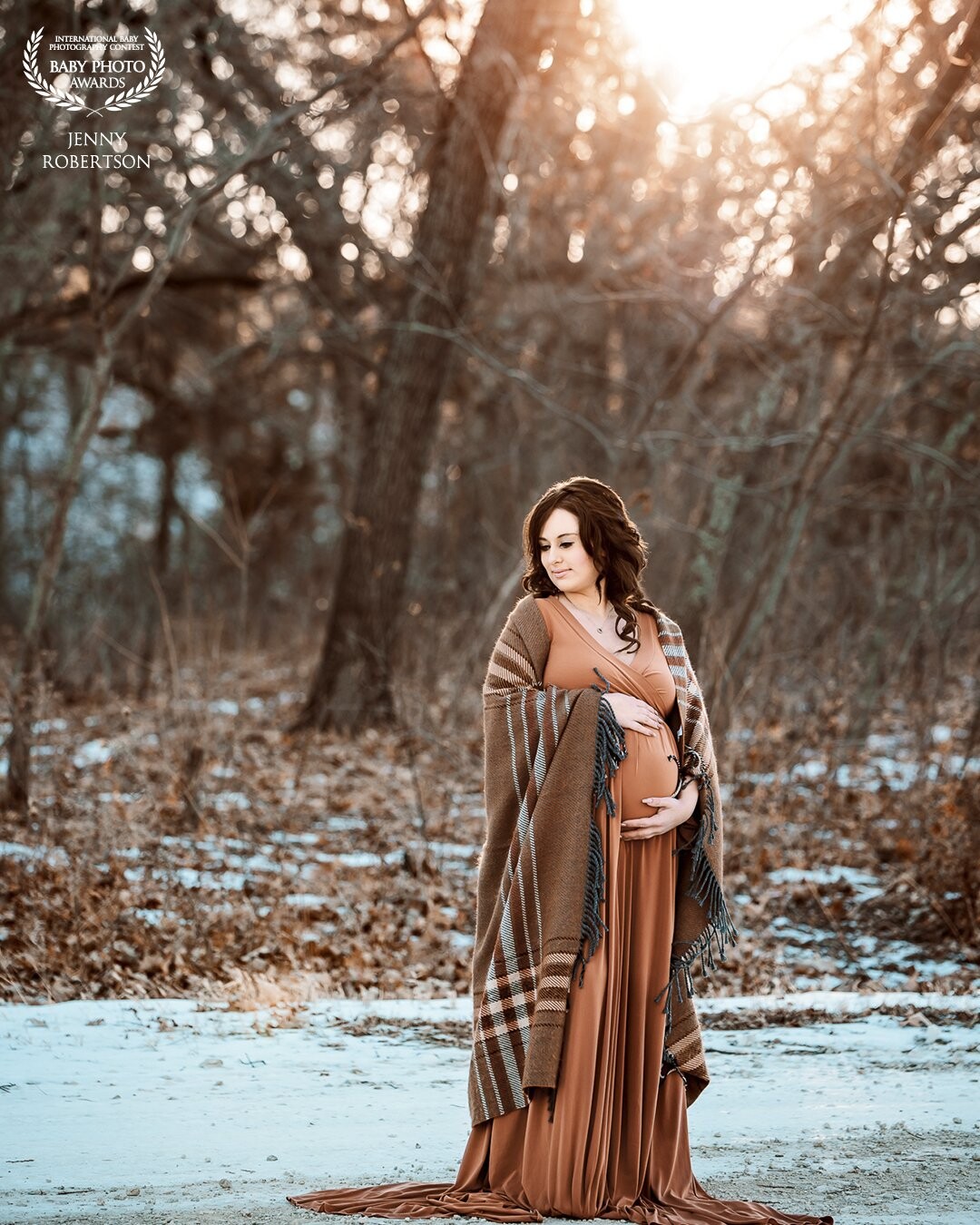 It was freezing this day but we went ahead with our session. It has been cropped out of this image but the sun was shining through the trees in the shape of a heart. It was so magical and a happy accident that I didn't see until I loaded my images for editing.