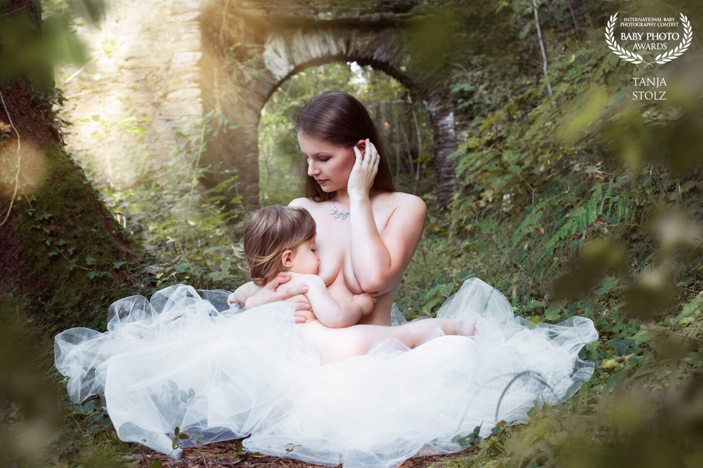 This is where my breastfeeding photo journey all began: my very first breastfeeding mom and her sweet child. We went outdoors into the forest, searching for a magical place and found this old ruins of an ancient castle. A gorgeous scene for a gorgeous woman. From this time on, I knew that I wanted to capture moments like this for all my clients and became known for my breastfeeding pictures. Thank you so much!