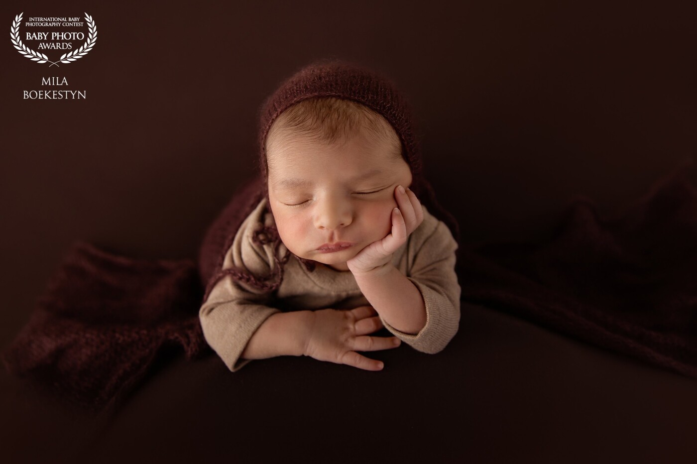 Disclaimer: this photo is a composite of 2 other photos, the baby was held at all times.<br />
<br />
After several props and family and siblings poses, this sweet little boy was so tired, that he almost posed himself in that pose. I love how this photo has turned out.