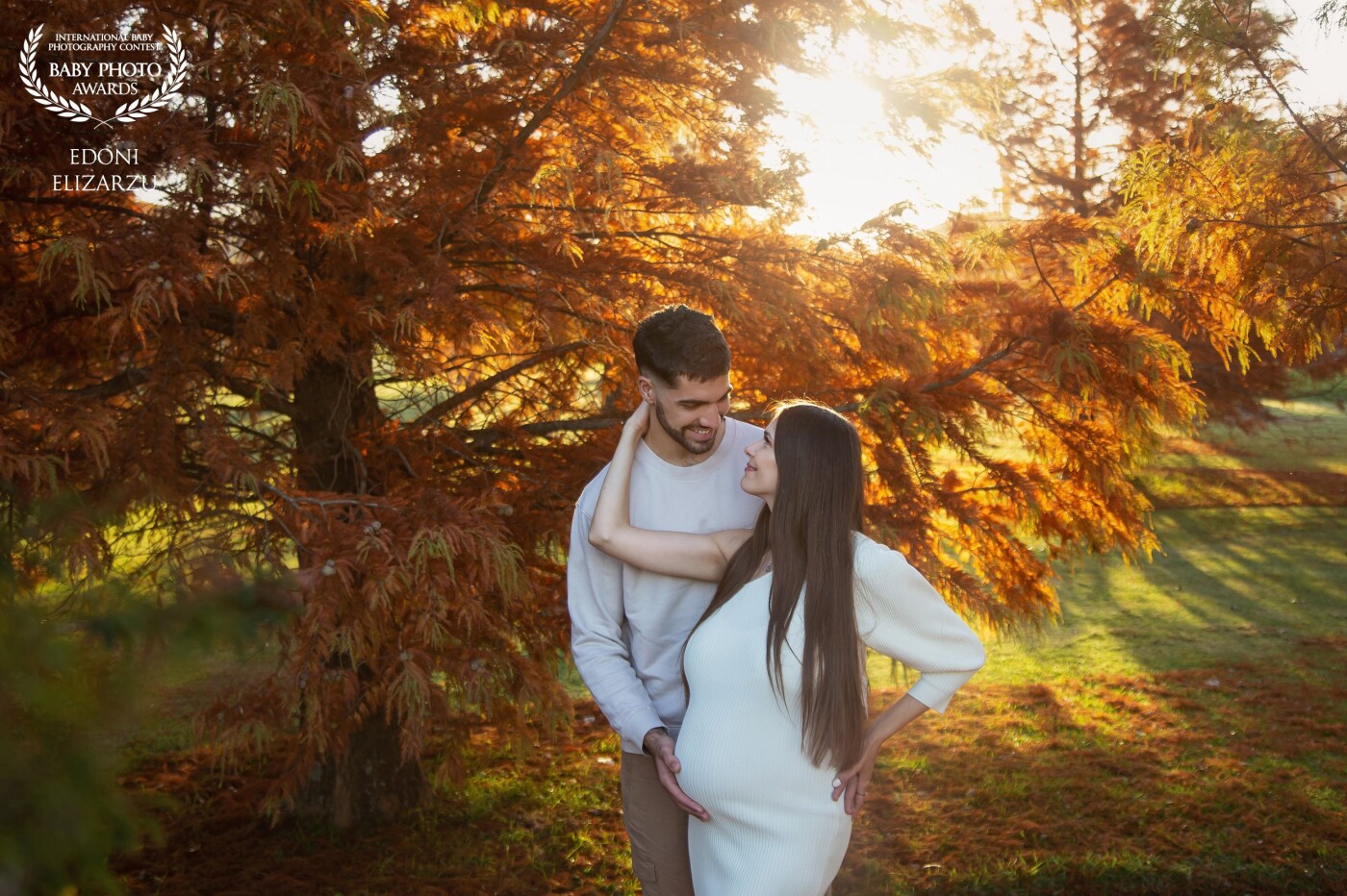 This beautiful couple came to record the sweet expectation of their baby girl. Love this photo with these autumn colors and their exchange of glances!