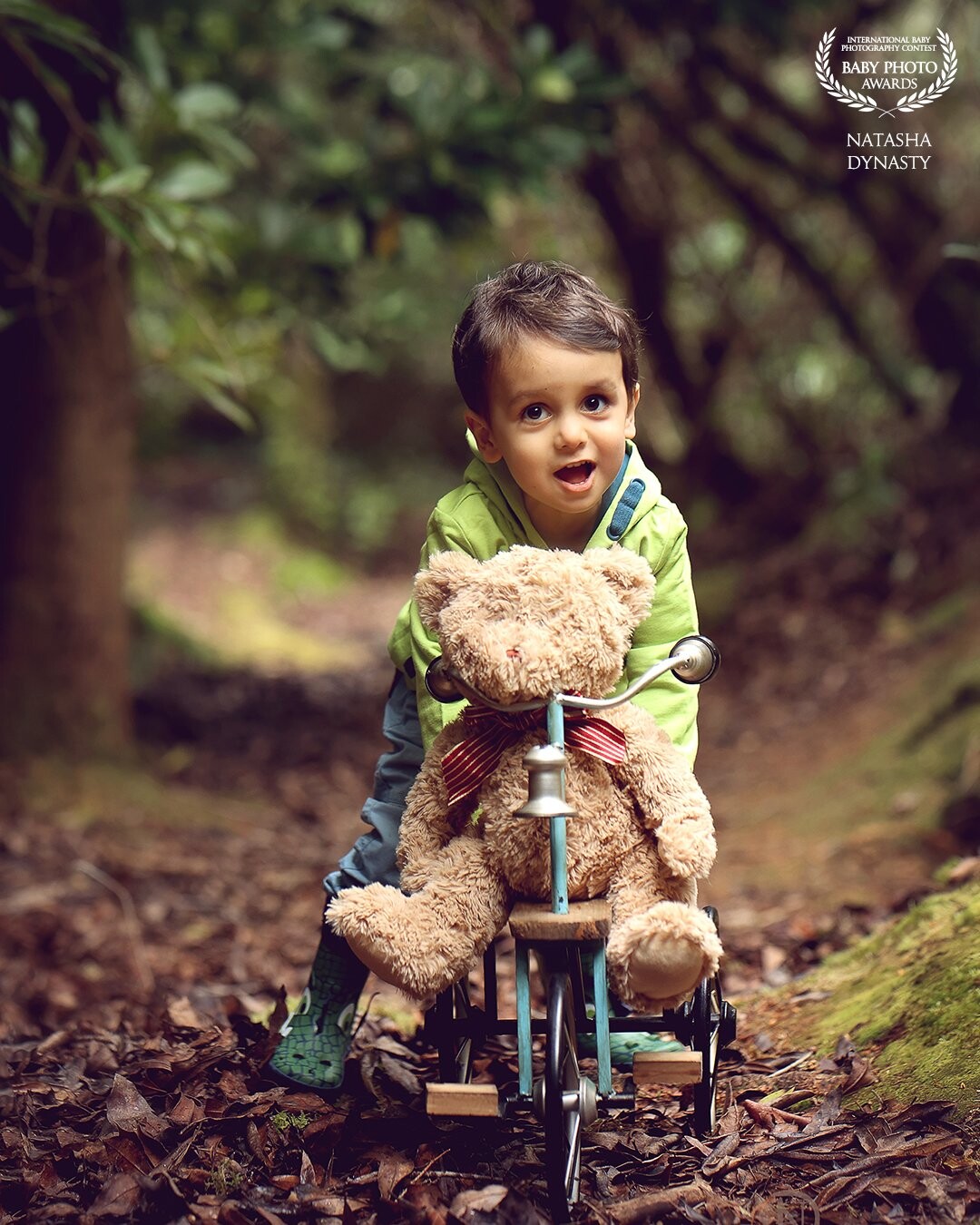 The Secret Forest Photoshoot. There is something magical about a little boy on a bike with his favourite bear. <br />
One of my favourite photoshoots as kids are so relaxed and taken by beauty of nature too. Hope you can feel this special magic in this photograph.
