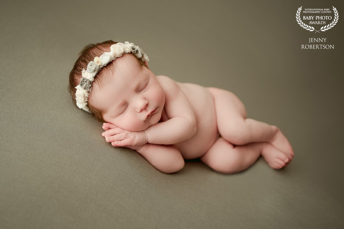 Simple is so beautiful. Side lying is one of my favorite poses because it shows all the baby details. It’s sometimes difficult to get the hands perfectly placed and that’s what I love about this particular image, her hands to cheek are so sweet.