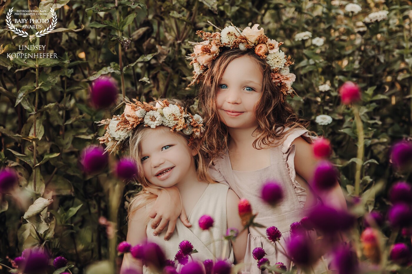 Eden and Harlow: These sweet sisters are such a joy to photograph. This session was photographed in their mom's flower garden; Bloom and Gathered. They are always out helping to plant and harvest so that their mom can make those gorgeous arrangements and floral crowns that she does for her clients.