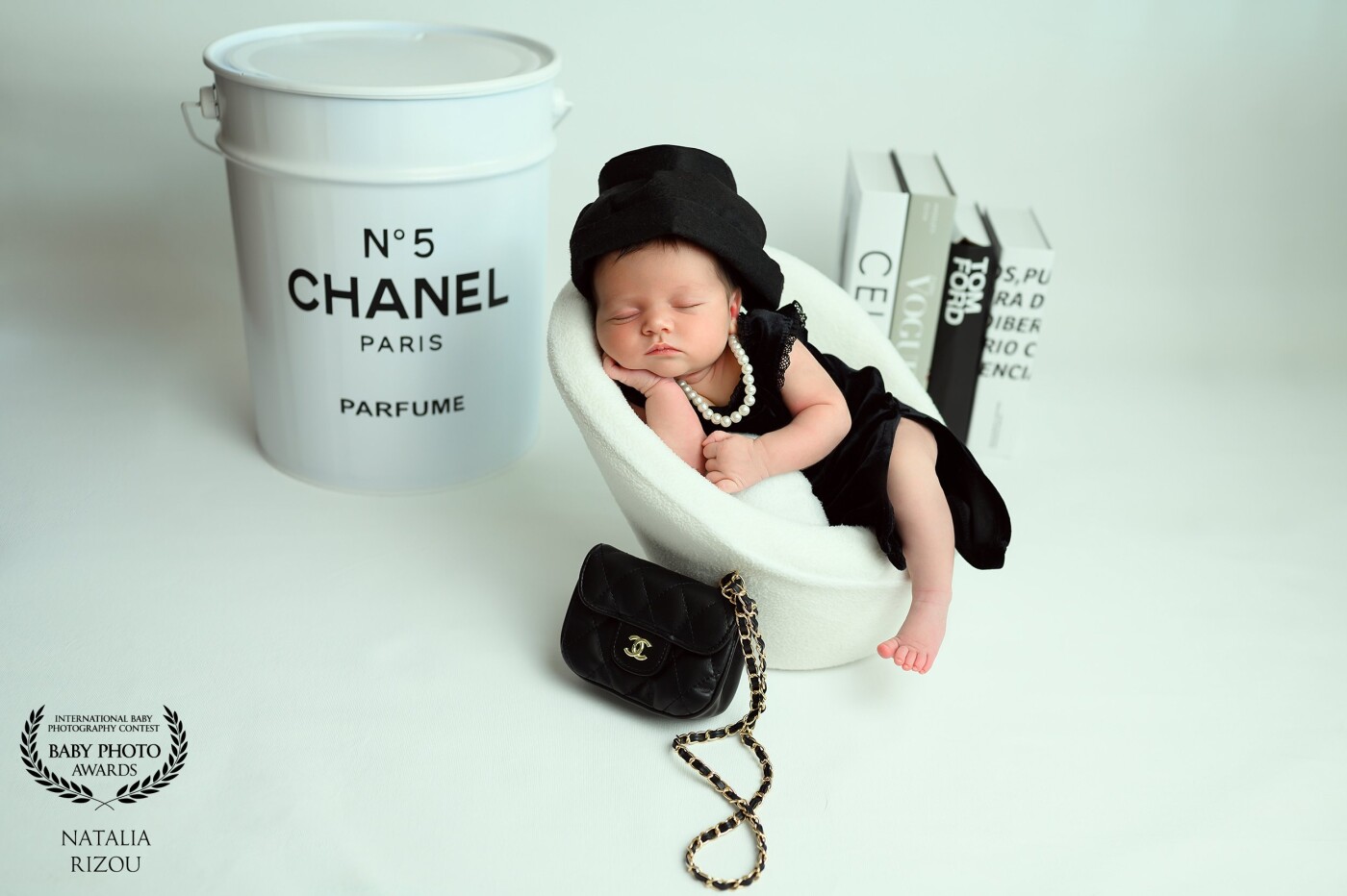 It can’t be denied that the concept of a female is that she is born a woman and not molded into one. Just by taking a simple, small black dress and a discreet hat you have the utmost baby outfit.