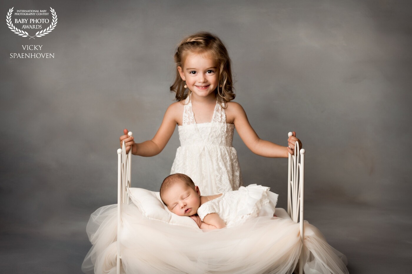 Photographing siblings is always a challenge. You have to have patience and capture the right moment. I'm so happy with this picture. It's one that their parents will love forever.