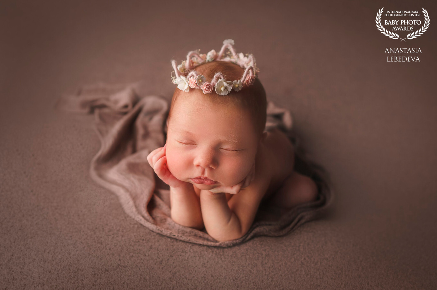 Hello everyone, I am very happy to introduce you little princess Emilia, who is only 10 days old. She slept so soundly that we did such a difficult pose without any problems. The baby's parents were happy that I made such an image.
