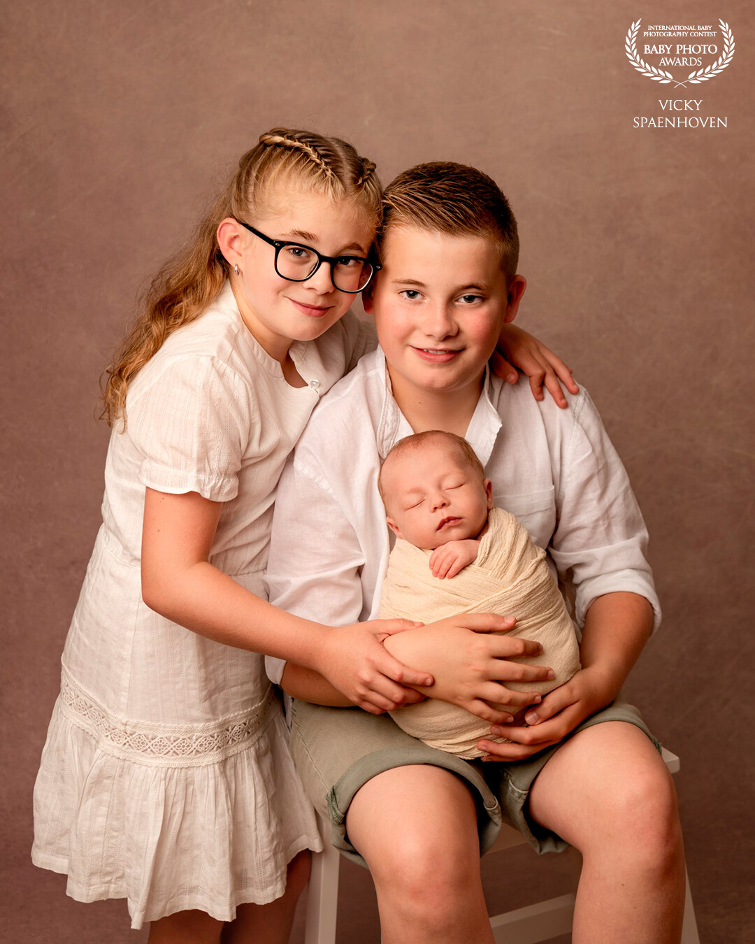The love between brothers and sister. I love the connection between them and the warm color tones.
