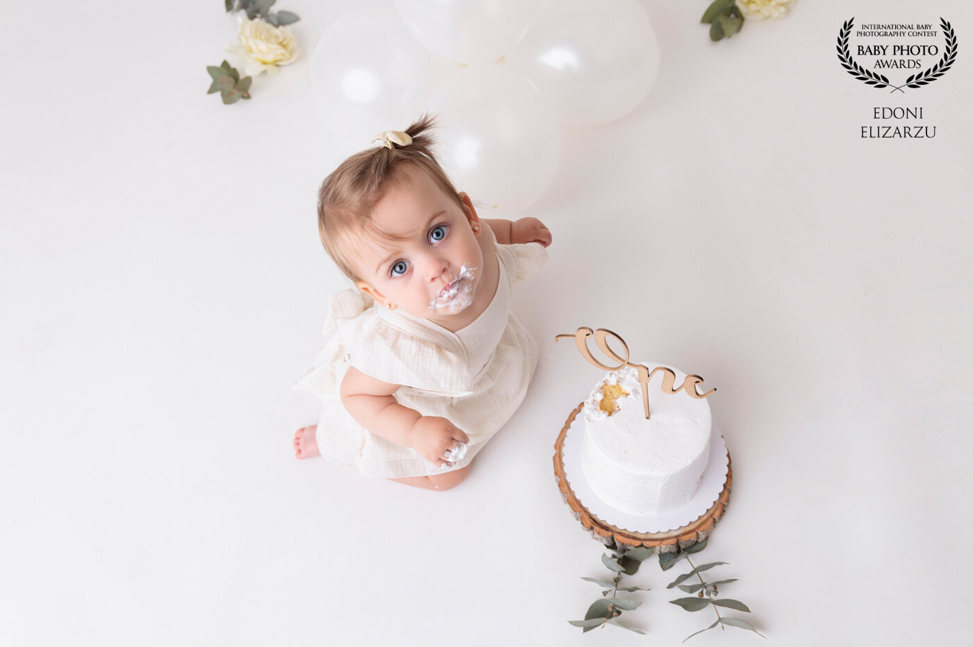 First year of this baby. She really enjoyed her photo session and her cake. I loved this photo from the first moment I saw it on camera.