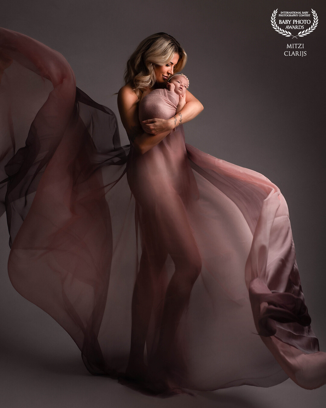 Something different in your newborn gallery. Love to do a picture like this after a pregnancy shoot with the same dress or fabric but now with your little baby.