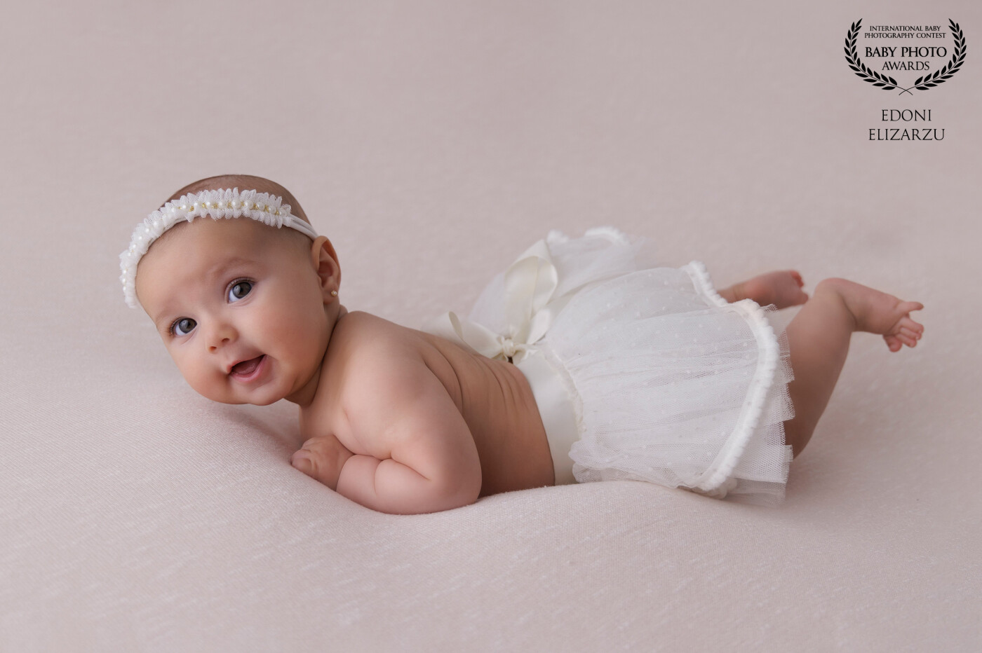 Beautiful baby girl! She was smiling all the photoshoot! Love this pic.