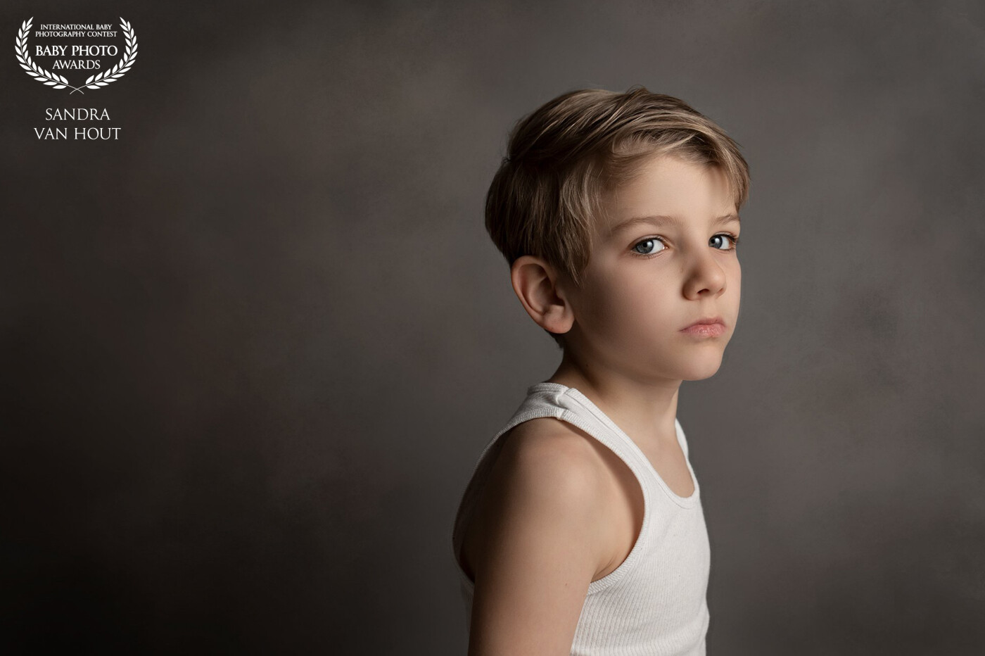 This is my youngest son! I am practice for fine-art portrait photography and I think I did a great job. This portrait means so much to me and I hope i will give my clients the same feeling when i photograph there children this way.