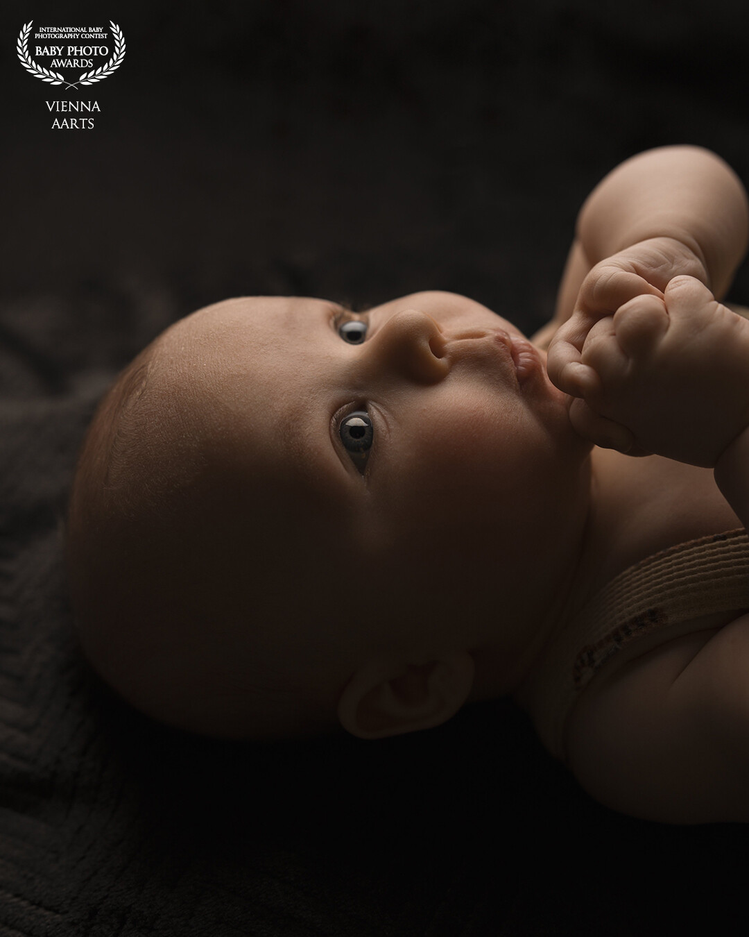 This beautiful three month old baby was so lovely to photograph! He was really looking to me through the camera.