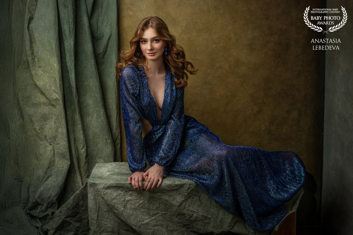 Hello! I am glad that my three works were included in the collection 108. In this photo is my beautiful model Ekaterina. Despite all the seriousness, she is only 17 years old. The blue dress emphasizes her figure very favorably. With such a model I was inspired to new ideas.