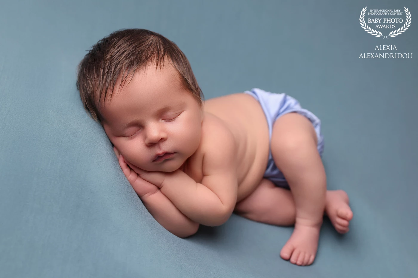 I loved how sweet and chubby he was. So cooperative for this favorite pose, showing off those perfect little rolls and his pure, peaceful expression.