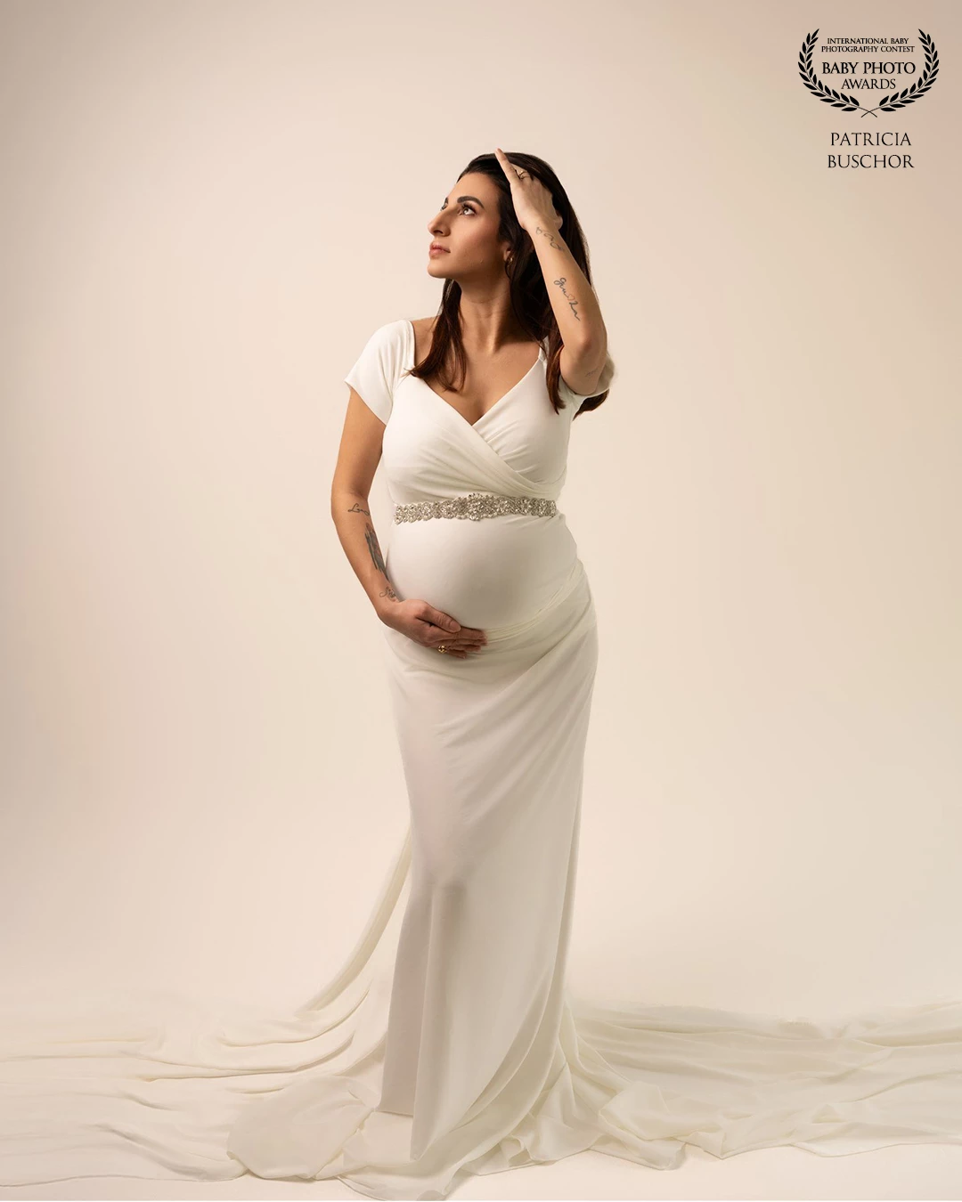 This image holds a very special place in my heart — not only because of the elegance and strength captured in this moment. As the photographer, I wanted to create a timeless and graceful portrait that celebrates the beauty of motherhood. The expecting mother radiated confidence and calm, perfectly complementing the flowing white gown and soft tones of the scene.