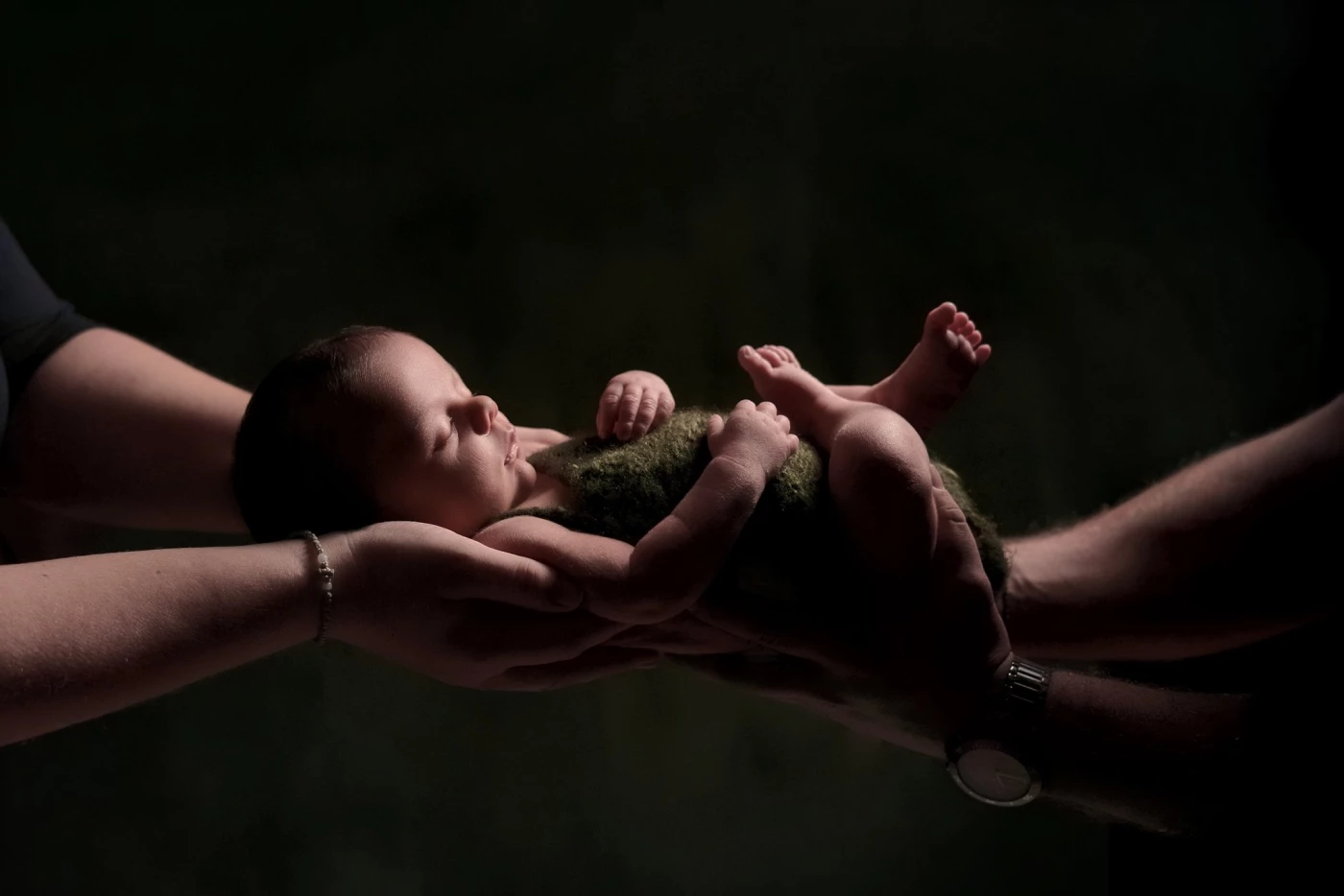 Geborgen in Hände voller Liebe