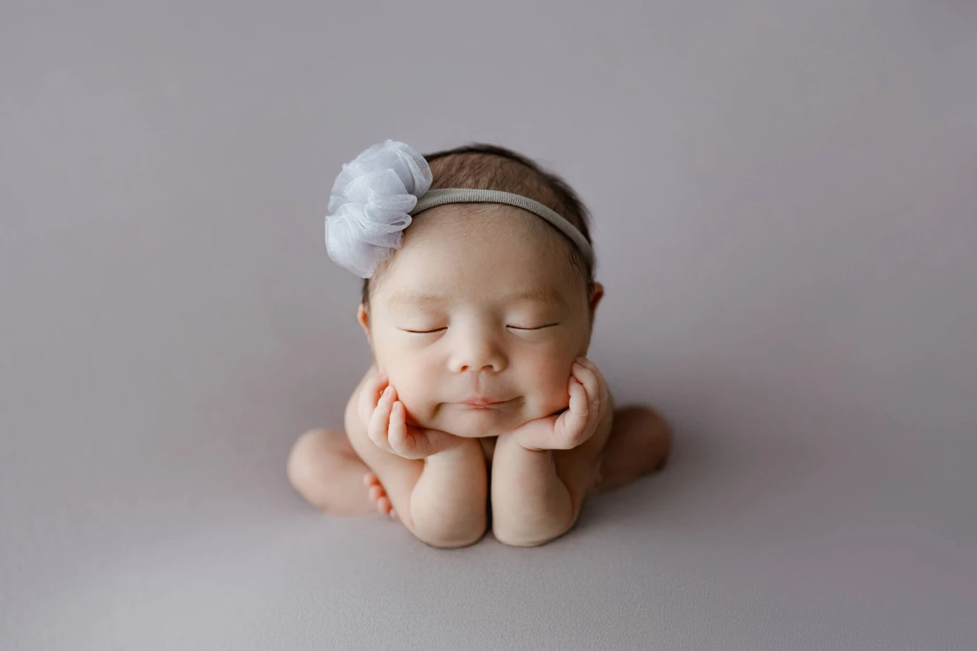 My focus was on simplicity, using minimal props to draw all attention to the baby's irresistible cut...