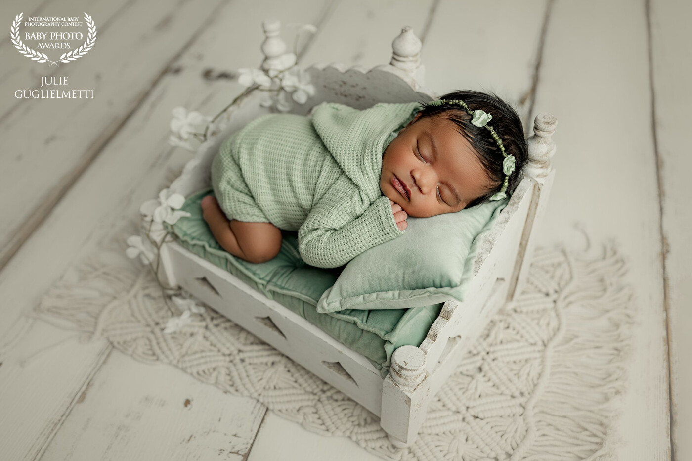 Tiny little jewel dressed in a mint green.<br />
Is there something cuter than those little adorable newborn outfits?