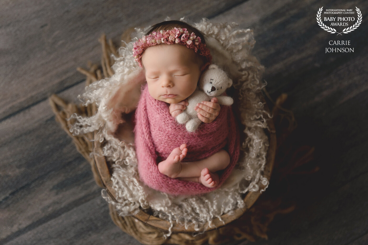 This little girl was 15 days old at the time of her session. Really like how this setup came together, with the pretty bright pink and matching delicate floral tieback.