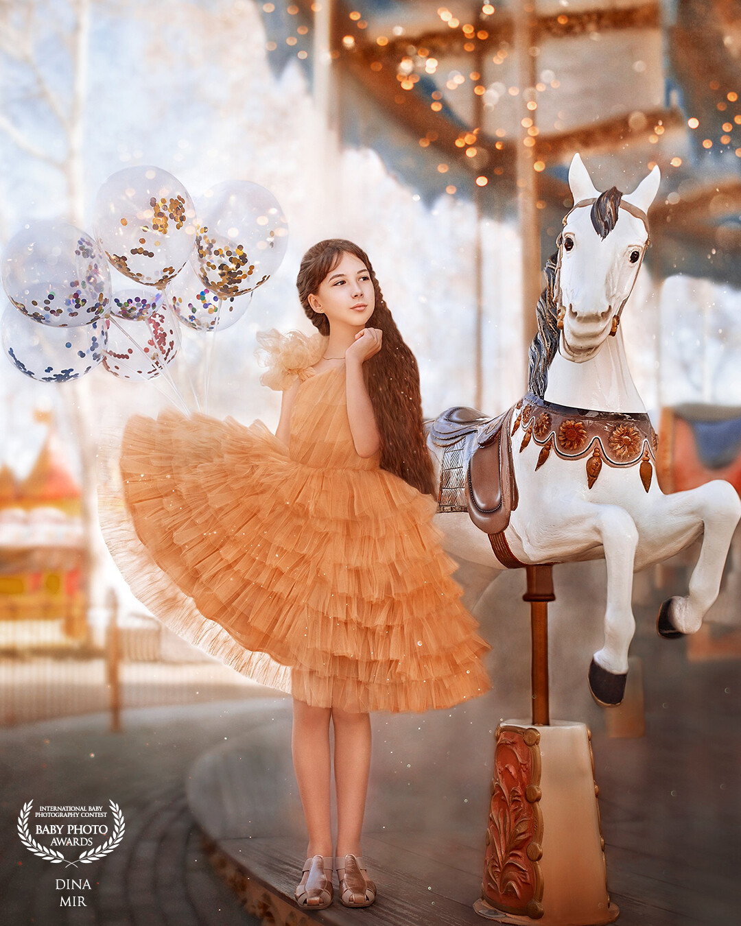 We all love carousels, as children. Beautiful horses quickly carry us. We laugh and wave our hands. <br />
-"Mom, dad, look at me. "<br />
What could be more beautiful than a smiling child