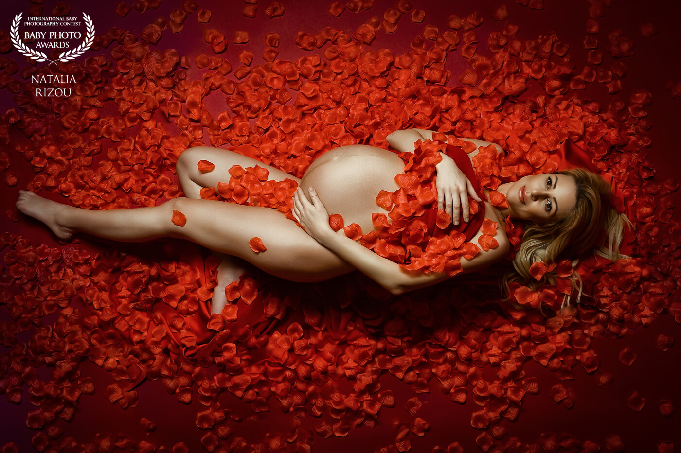 The colour red symbolizes so many elements in life; energy, passion, strength, courage, warmth, security and many more. It is a powerful color and all these are representative of a woman during pregnancy. Nothing is more creative and miraculous as the conception of a child.