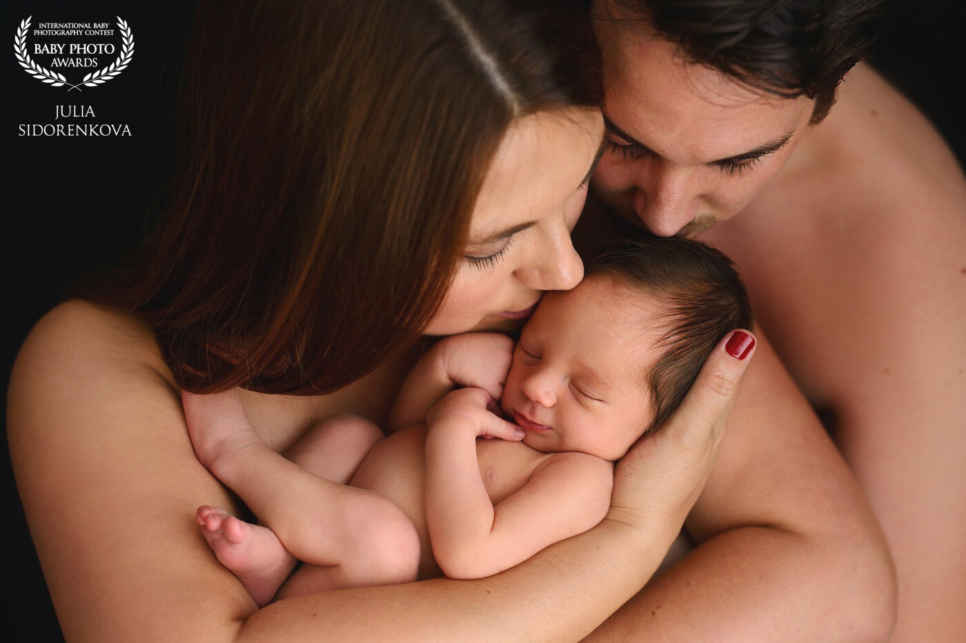 A very intimate moment during the newborn photosession. A lot of skin, warmth and love.