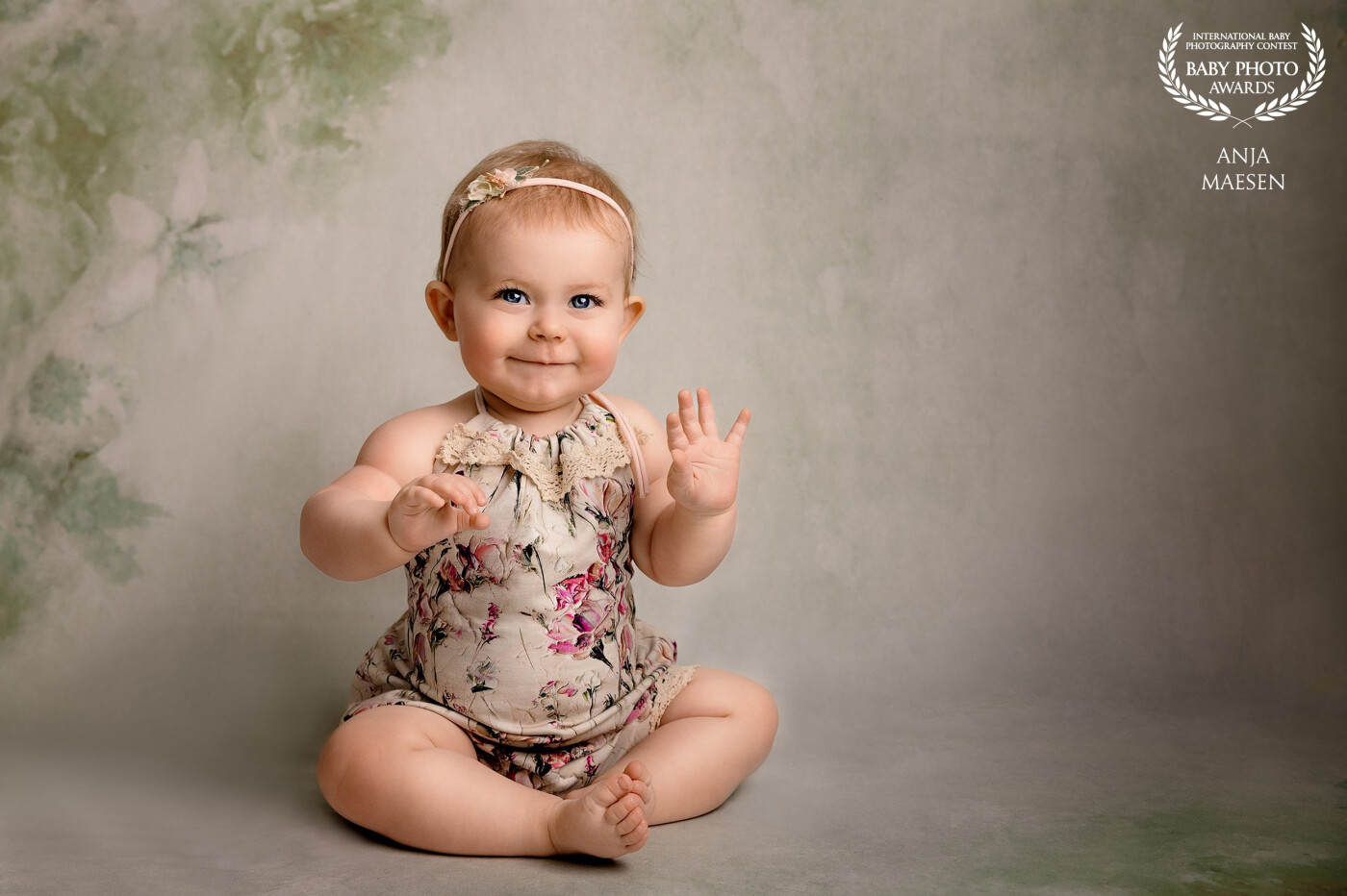 This sweet adorable girl was 9 months old for her first shoot. She was smiling the whole shoot, a dream for every photographer...